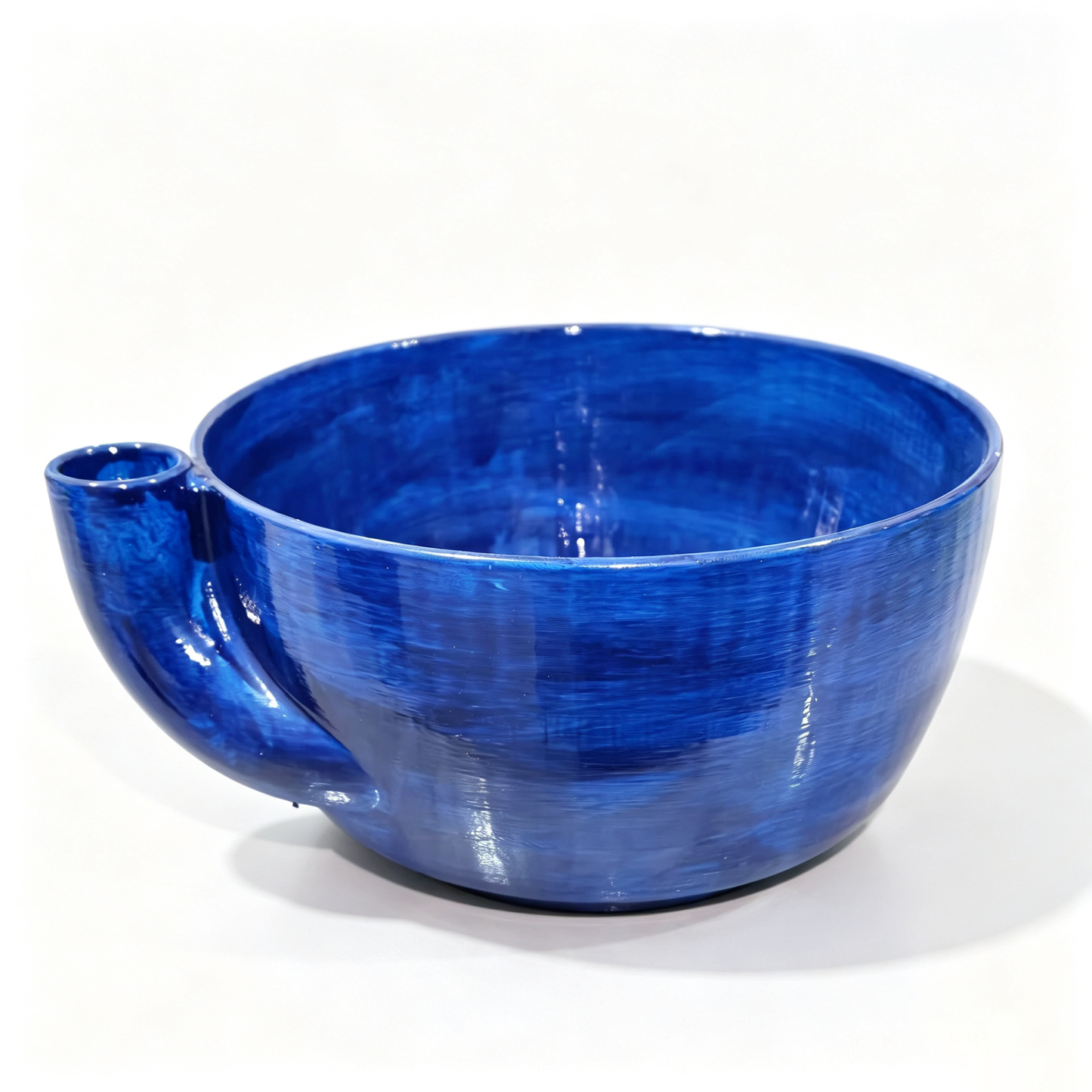 Rotating vegetable and fruit rinsing bowl with a central conical hole