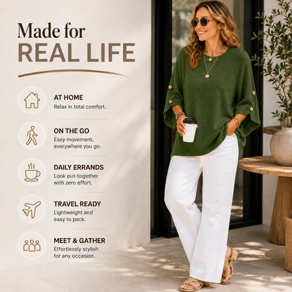 Women's loose-fitting crew neck sweater with three-quarter sleeves and buttoned cuffs