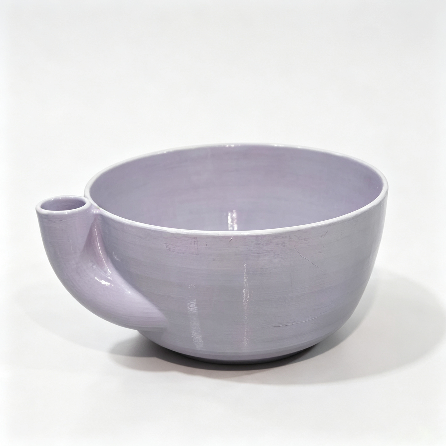 Rotating vegetable and fruit rinsing bowl with a central conical hole