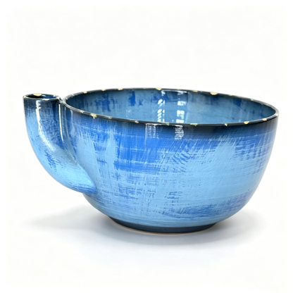 Rotating vegetable and fruit rinsing bowl with a central conical hole