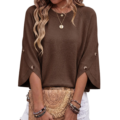 Women's loose-fitting crew neck sweater with three-quarter sleeves and buttoned cuffs
