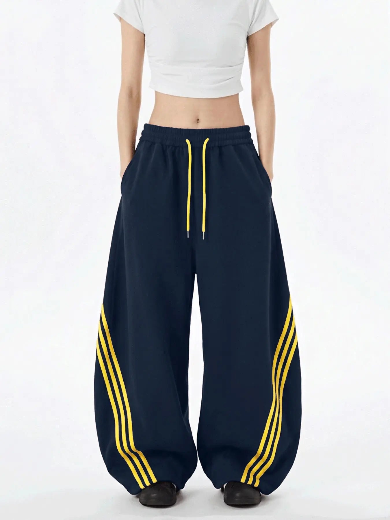 Retro Triple-Stripe Wide-Leg Pants Relaxed Comfort. Effortlessly Cool.